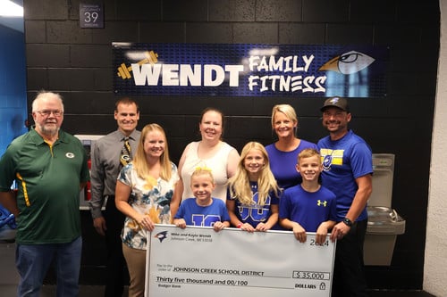Wendt Family Presents a Check