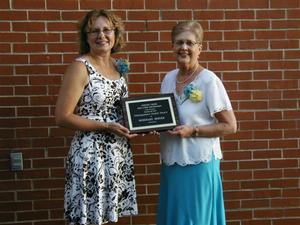 Rosemary Berger receiving an award